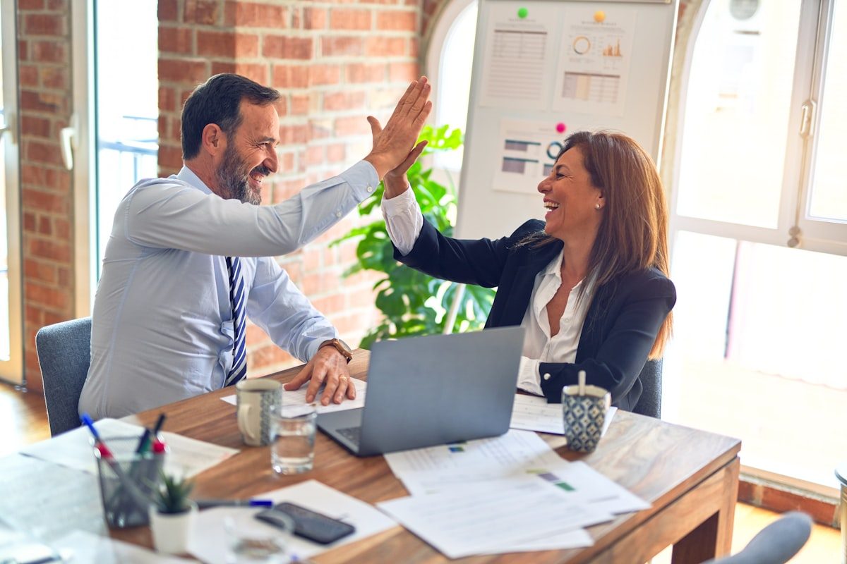 A relaxed, friendly consultation between NFIS and happy clients